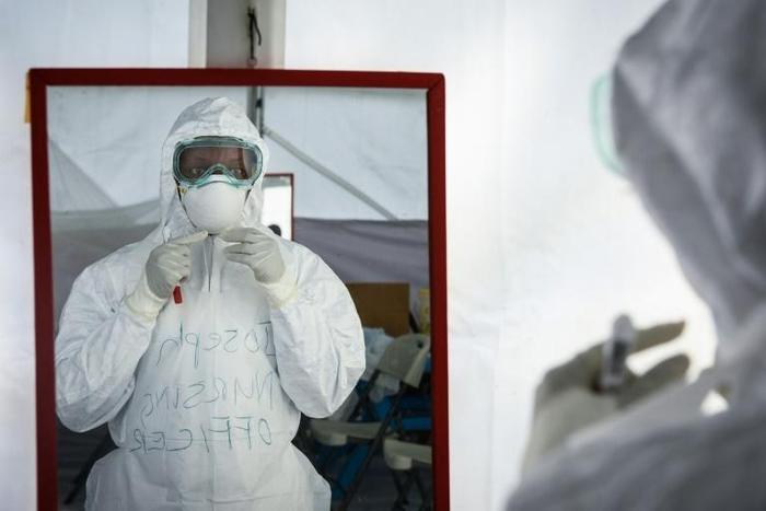 Ebola, which spreads among humans through contact with bodily fluids, is one of the most virulent tropical hemorrhagic fevers, often killing within days of infection 
