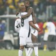 Gyan and Agogo celebrate