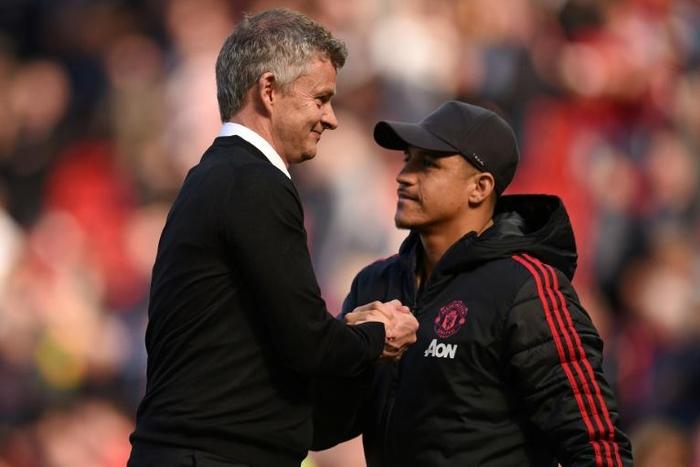 Ole Gunnar Solskjaer (left) is still counting on Alexis Sanchez (right) to come good at Man Utd