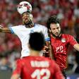 DR Congo forward Cedric Bakambu (L) wins an aerial duel against hosts Egypt during the Africa Cup of Nations