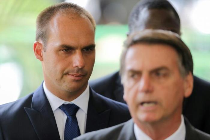 Eduardo Bolsonaro (L) is currently a member of the Brazilian parliament and accompanied his father to a private meeting with Trump during a diplomatic visit to Washington in March
