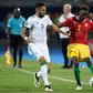 Algerian star Riyad Mahrez (L) tries to prevent Guinean Issiaga Sylla crossing during an Africa Cup of Nations last-16 match in Cairo