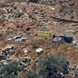 Israeli ambulance crews and security forces deploy to the scene of a bomb attack near the Israeli settlement of Dolev in the occupied West Bank on August 23, 2019