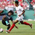 Yasser Larouci of Liverpool is fouled by Sevilla's Joris Gnagnon in Sevilla's 2-1 win in a pre-season friendly at Fenway Park