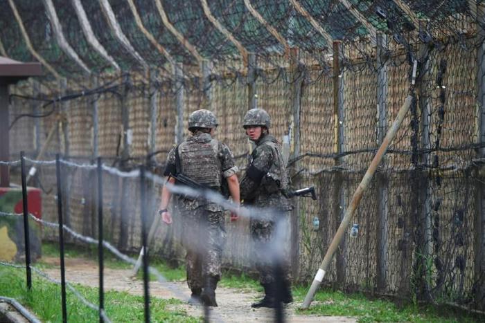 The four-kilometre-wide DMZ runs for 250 kilometres (160 miles) across the Korean peninsula