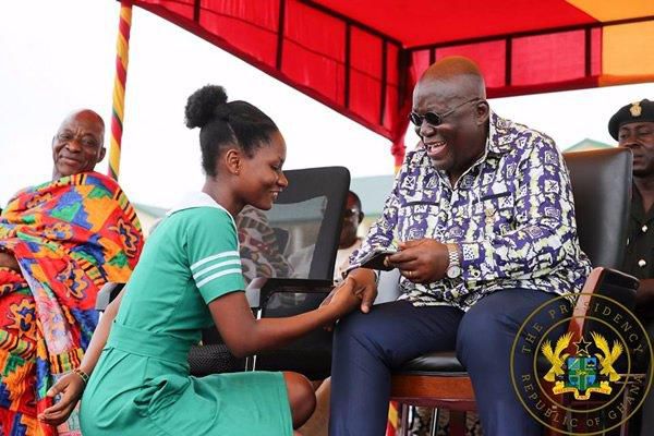 Nana Addo with a nurse