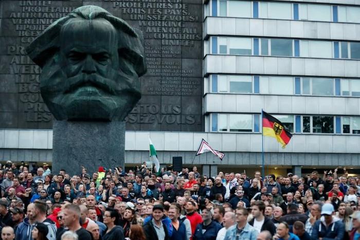 Thousands protested in front of the giant bust of Karl Marx last year after a foreigner stabbed and killed a German national