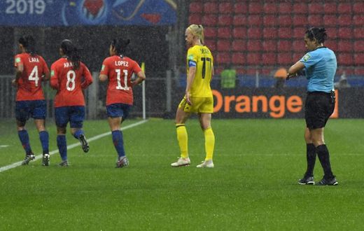 Rain forced a halt in play in the second half of Sweden's match against Chile at the women's World Cup on Tuesday