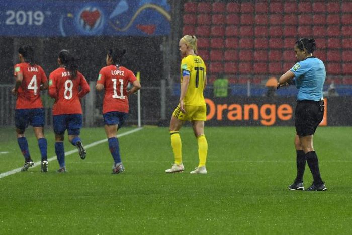 Rain forced a halt in play in the second half of Sweden's match against Chile at the women's World Cup on Tuesday