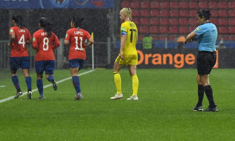Rain forced a halt in play in the second half of Sweden's match against Chile at the women's World Cup on Tuesday