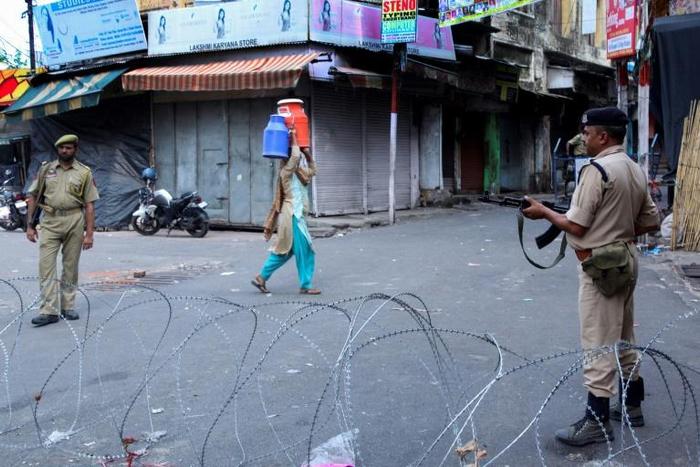 Kashmir has been virtually cut off from the outside world with phone and internet links cut and thousands of troops enforcing a curfew