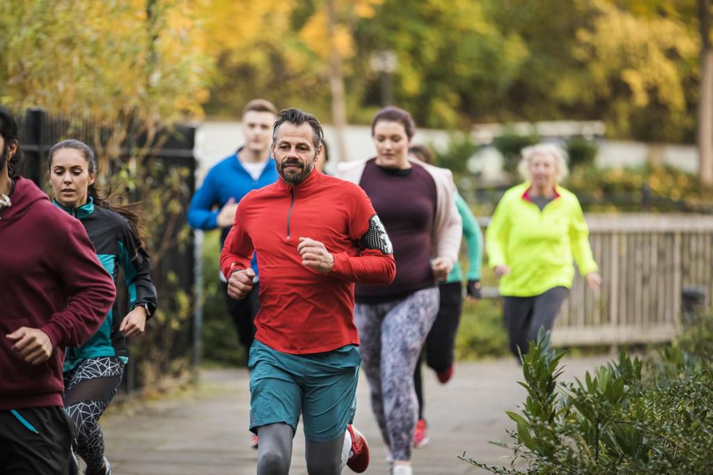 Group Of Friends Running Together