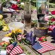 Candles and flowers a placed in front of Ned Peppers bar after the mass shooting over the weekend in Dayton, Ohio