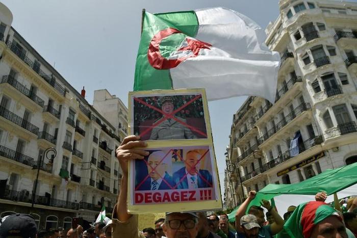 Algerians demonstrate for a 16th consecutive Friday demanding a political overhaul in the North African country after the ouster in April of veteran president Abdelaziz Bouteflika before new presidential polls can be held