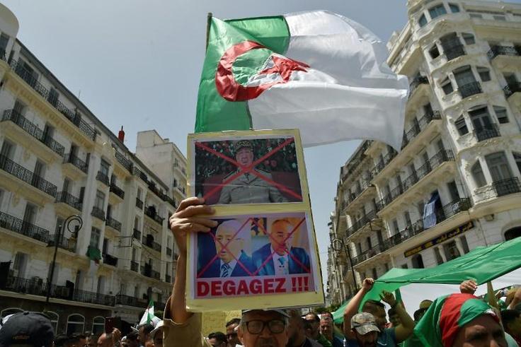Algerians demonstrate for a 16th consecutive Friday demanding a political overhaul in the North African country after the ouster in April of veteran president Abdelaziz Bouteflika before new presidential polls can be held