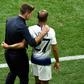 Tottenham's Lucas Moura speaks with boss Mauricio Pochettino
