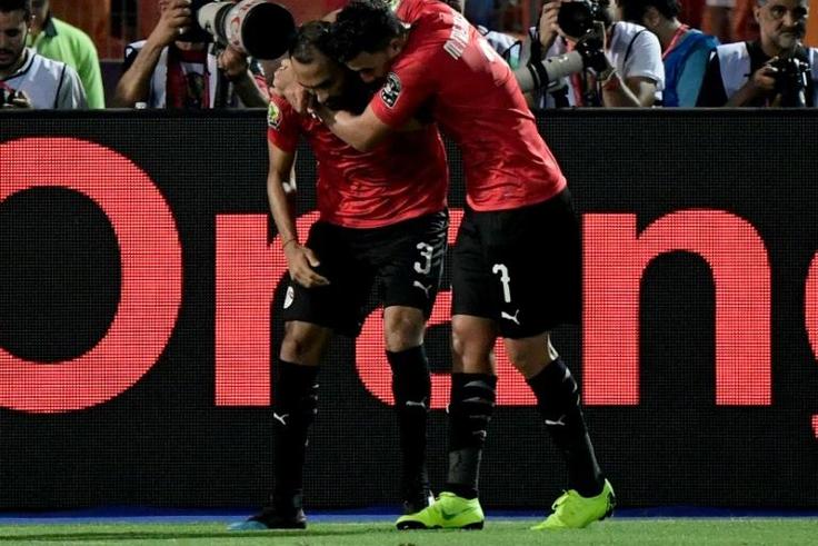 Egypt's defender Ahmed Elmohamady (L) and Mahmoud 'Trezeguet' Hassan starred as Egypt finished Group A with a perfect record