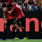 Egypt's defender Ahmed Elmohamady (L) and Mahmoud 'Trezeguet' Hassan starred as Egypt finished Group A with a perfect record