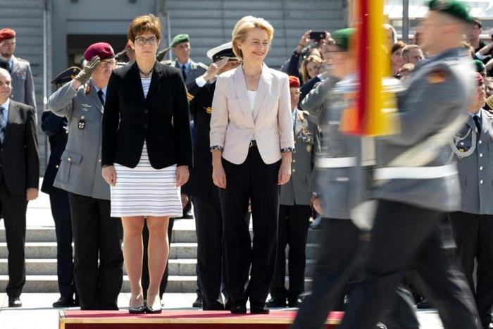 Annegret Kramp-Karrenbauer (left) has taken over from Ursula von der Leyen at the helm of Germany's defence ministry