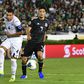 Cuba's Yasmani Lopez (L) vies for the ball with Mexico's forward Raul Jimenez (R) during their Concacaf Gold Cup match in California -- after which Lopez defected
