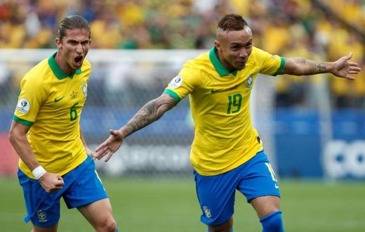 Brazil's flying winger Everton (right) celebrates scoring his second international goal, against Peru at the Copa America