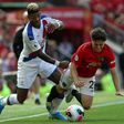 Manchester United midfielder Daniel James vies with Crystal Palace's Patrick van Aanholt