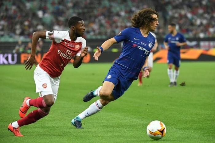 David Luiz (right) moved across London from Chelsea to Arsenal on Thursday