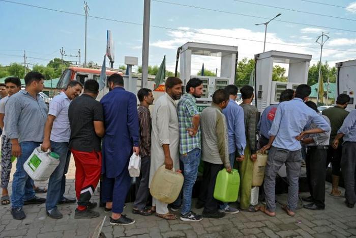 Security has been ramped up in the Indian-administered part of Kashmir, sparking panic and long lines at fuel stations and food stores