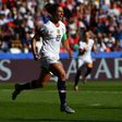 Carli Lloyd scored twice and missed a penalty as the USA eased to a 3-0 win over Chile to qualify for the last 16 of the World Cup