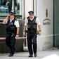 After the stabbing security cordon tape was put up around the entrance of the inteiror ministry while guards and police officers were stood outside