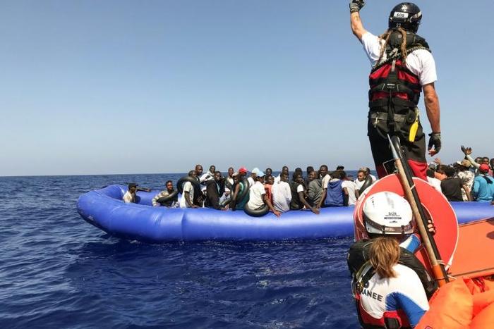Ocean Viking, jointly operated by SOS Mediterranean and MSF, patrols international waters some 50 nautical miles off the coast of Tripoli. A crew member is shown here on a dinghy approaching that of the 81 migrants rescued Sunday