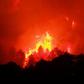 A fire fanned by a strong wind raged early Thursday in the Aude department of southern France.