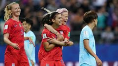 Alex Morgan (2nd right) celebrated her five-goal haul with Megan Rapinoe