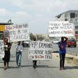 Protesters were angered over one alleged corruption case where 42 fire trucks were purchased at a cost of $1 million each