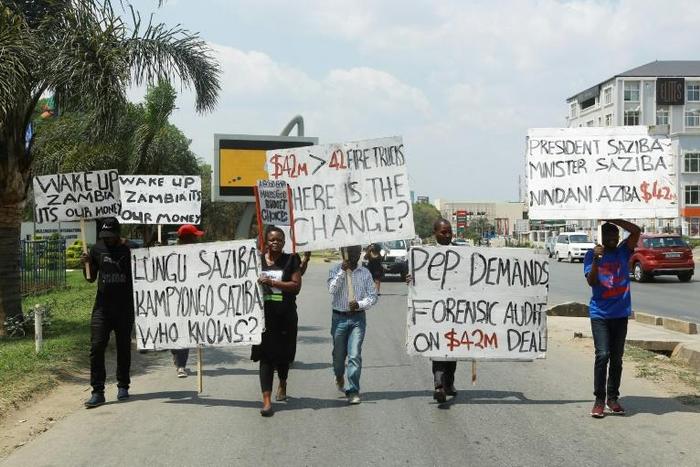 Protesters were angered over one alleged corruption case where 42 fire trucks were purchased at a cost of $1 million each