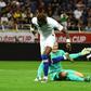 Chelsea forward Tammy Abraham (L) scores a goal past Barcelona goalkeeper Marc-Andre ter Stegen during their friendly in Saitama, Japan