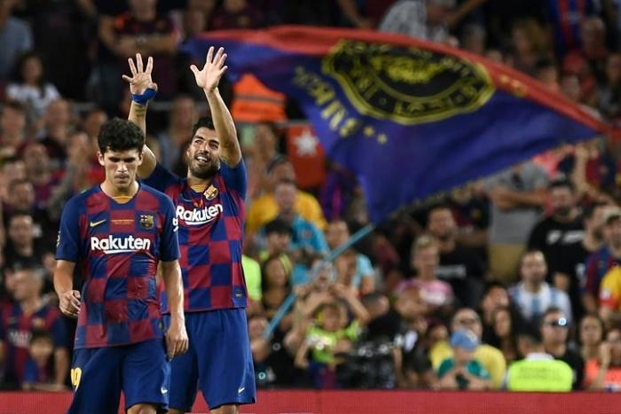 Luis Suarez's late strike won Sunday's friendly against Arsenal at the Camp Nou
