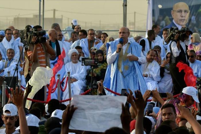 Mauritania's ruling party candidate, ex-general Mohamed Ould Ghazouani, has claimed victory in the first round of presidential elections