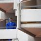 A forensic expert on a balcony at the apartment building in Cologne where a Tunisian-German couple are suspected of producing the deadly poison ricin