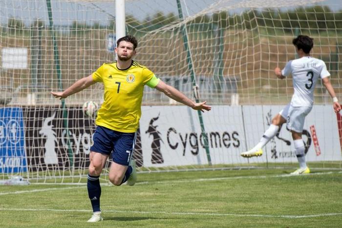 Oliver Burke (pictured June 2018) tapped in to seal a victory that sees Scotland move up to third