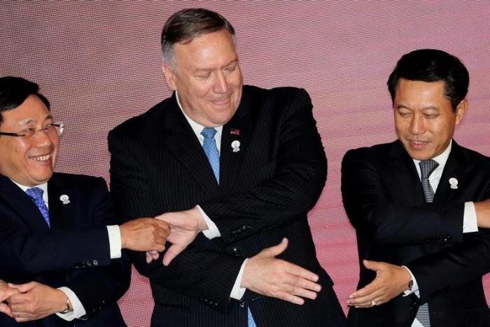 US Secretary of State Mike Pompeo with Vietnam Foreign Minister Pham Binh Minh (left) and Laos Foreign Minister Saleumxay Kommasith