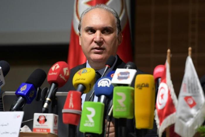 The head of Tunisia's electoral body Nabil Baffoun announces presidential polls for September 15