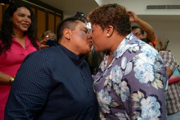 Alexandra Chavez (left) and Michelle Aviles have become the first same-sex couple to get married in Ecuador