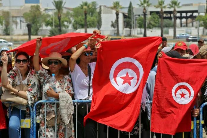 Tunisians pack a the Djellaz cemetery in Tunis on July 27, 2019 for the final farewell to president Beji Caid Essebsi, the country first democratically elected head of state who died on Thursday aged 92