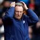 Neil Warnock's return to the Championship with relegated Cardiff began with a disappointing 3-2 defeat by Wigan