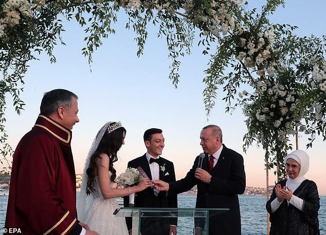 Turkish president Recep Tayyip Erdogan (centre, right) was a guest at Mesut Ozil's wedding