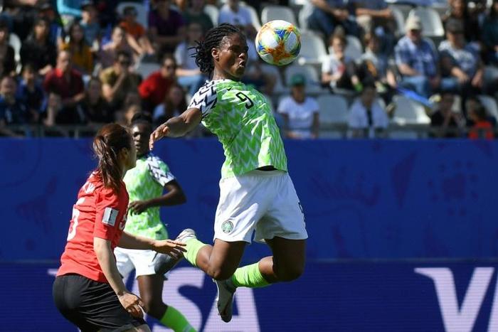 Desire Oparanozie (R) in action for Nigeria at the women's World Cup. She plays in France so Monday's clash with the hosts will be a particularly special occasion for her