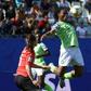 Desire Oparanozie (R) in action for Nigeria at the women's World Cup. She plays in France so Monday's clash with the hosts will be a particularly special occasion for her