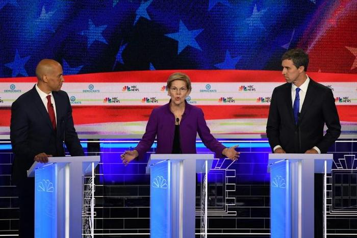 Democratic presidential hopefuls (from L) US Senator Cory Booker, US Senator Elizabeth Warren and former congressman Beto O'Rourke participate in the first Democratic primary debate of the 2020 presidential campaign season on June 26, 2019