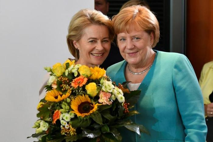EU president-elect Ursula von der Leyen, seen posing in Berlin with Angela Merkel, won a wafetr-thin majority -- a weak foundation from which to unite an increasingly fragmented Europe
